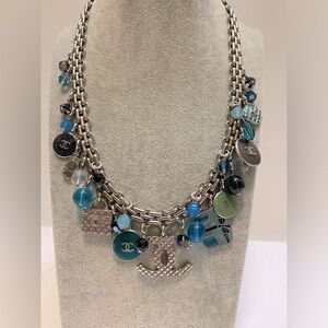 CHANEL costume jewelry. CC Necklace w/ silver hardware; turquoise color charms
